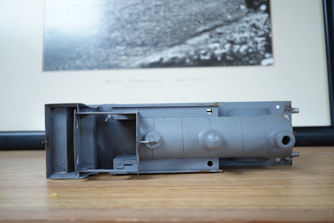 Eleven 0 gauge model railway items including; a bogie stake wagon, two mineral wagons, a North British coal wagon and two further open wagons, a partly constructed brake van, together with a Lima LMS 4F locomotive, two L